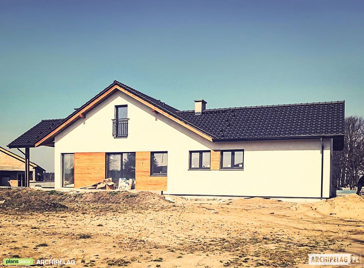 House Plan with Bonus Room and Indoor-Outdoor Fireplace